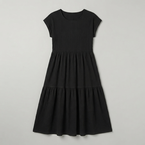 A black short-sleeve tiered dress with a textured, ribbed fabric, shown flat against a light gray background.